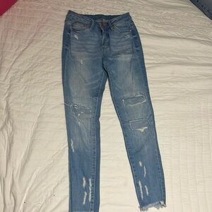 Simple society skinny stretch ripped jeans.  Size 1/25